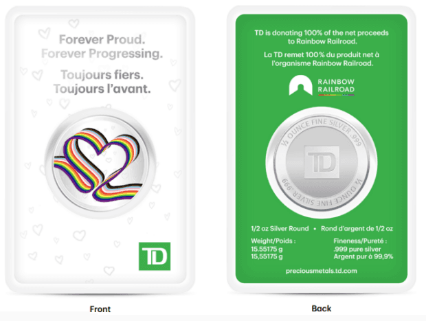 Front of a silver TD coin with a rainbow heart design on a white background.