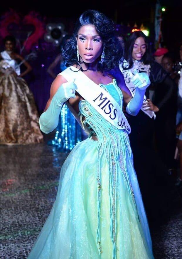 Person wearing a long blue gown.