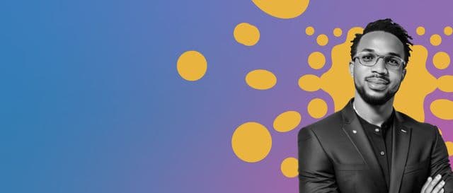 Person in glasses and a suit against a colorful graphic background.