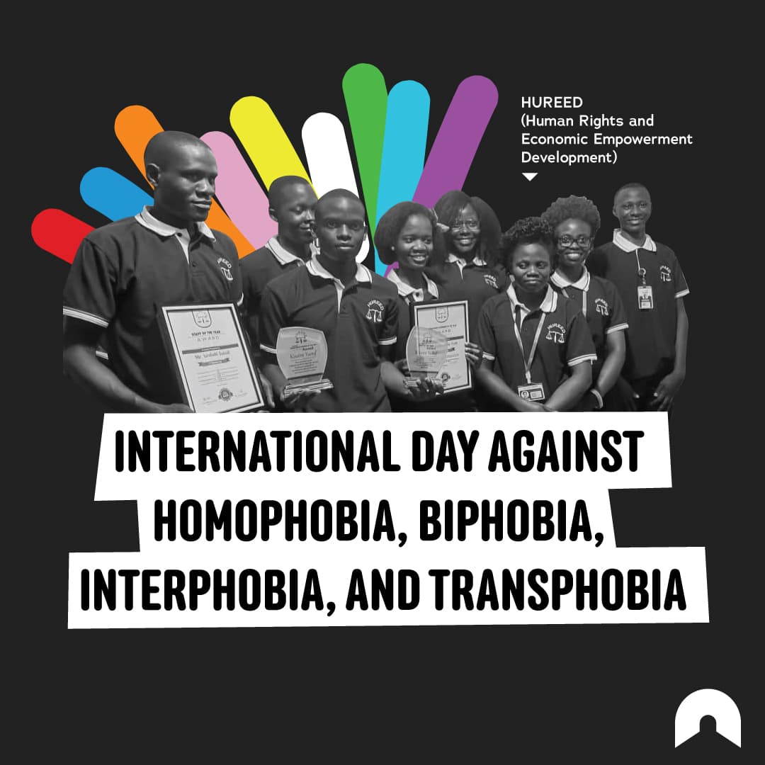 International Day Against Homophobia, Biphobia, Interphobia, and Transphobia graphic featuring a group holding certificates with colourful rays behind them.
