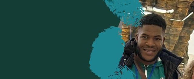 A person smiling outdoors, shown in a stylized graphic layout with teal brush shapes.