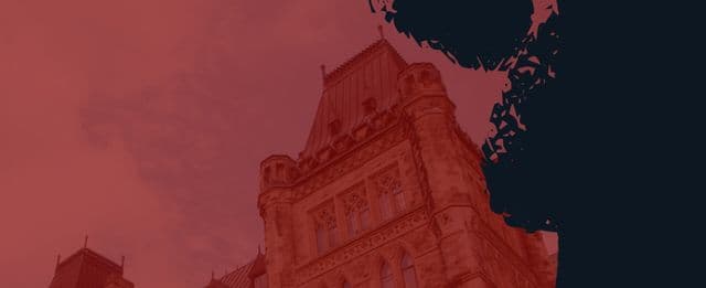 Photo of a historic Gothic-style building with a red overlay and dark silhouette design on the right side.